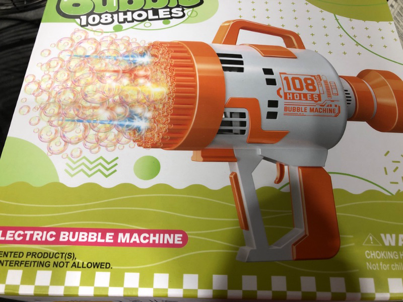 Photo 1 of 108 Holes Bubble Machine Gun - 2023 Upgraded Light Up Bubble Bazooka with Bubble Solution Electric Cannon Gun Blaster Bubbles Maker, Summer Outdoor Toys Gift for Birthday Wedding Party (Orange)
