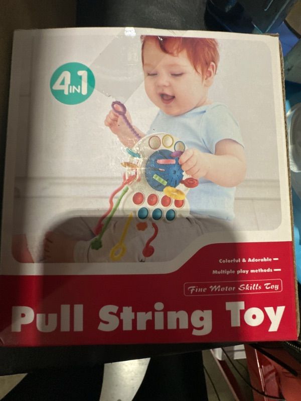 Photo 1 of 4 in 1 pull string toy 