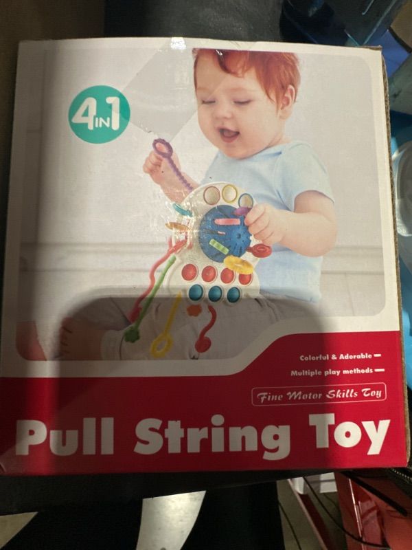 Photo 1 of 4  in 1 pull string toy