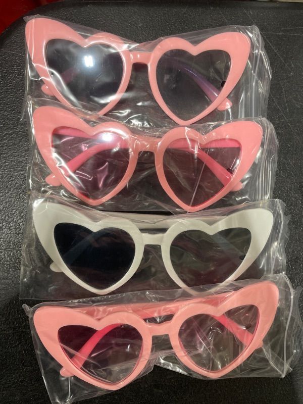 Photo 1 of AOOFFIV Heart Shape Sunglasses Rimless Transparent Candy Color Heart Glasses Love Eyewear Party Favors