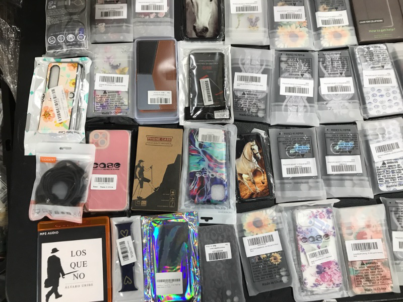 Photo 1 of MISC ITEMS / BOX LOT!! 
OVER 50 RANDOM PHONE CASES
--- VARIOUS SIZES, STYLES & CONDITIONS ---
--- REVIEW PICTURES CAREFULLY ---
--- LOTS ARE SOLD AS IS ---