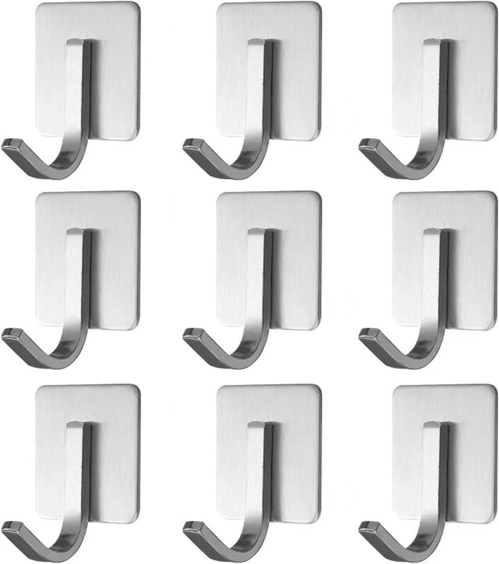 Photo 1 of Adhesive Hook, Towel Hooks, 9 Pack Improved Adhesive Hooks, Wall Hooks for Hanging Heavy Duty, Waterproof shower hook, Towel rack hook, wall mounted, Towel Hooks for Bathroom, Kitchen (9 Pack-Silvery)
