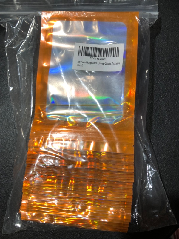 Photo 2 of 100 Pieces Orange Smell Proof Mylar Bag,Resealable Holographic Packaging bags,Cute Package Bags for Small Business,Sealed Mylar Foil Pouch Bags for Gift,Candy,Jewelry,Sample Packaging