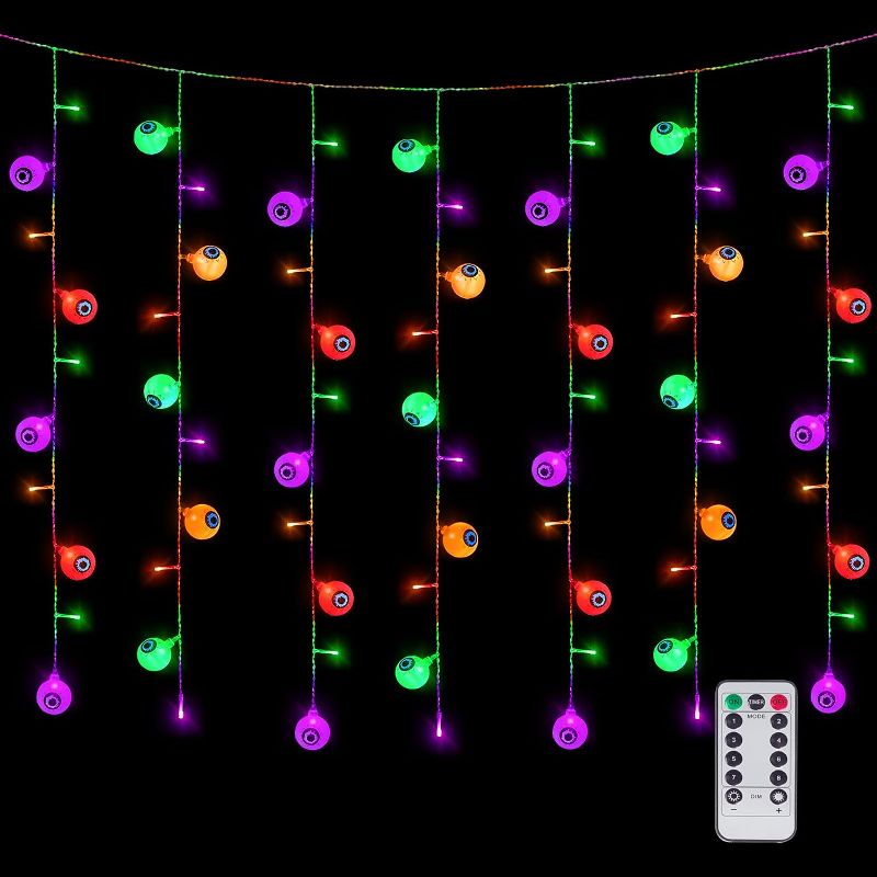 Photo 1 of Newhale 8 Modes Halloween Curtain String Lights with Eyeballs, USB Plug in Wall Lights Halloween Decorations for Indoor or Outdoor, Helloween Window Lights Decor with Remote Control
