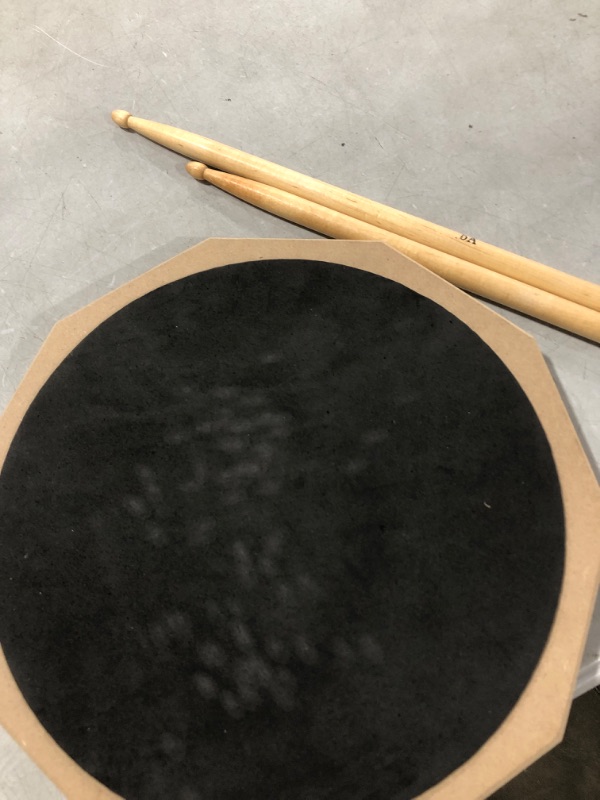 Photo 1 of Musfunny Drum Practice Pad and Sticks Set 12 Inch Silent Snare Drum Pads Double Sided Drum Mute Pads with 5A Drum Sticks Storage Bag for Drumming (12 inch Blue)