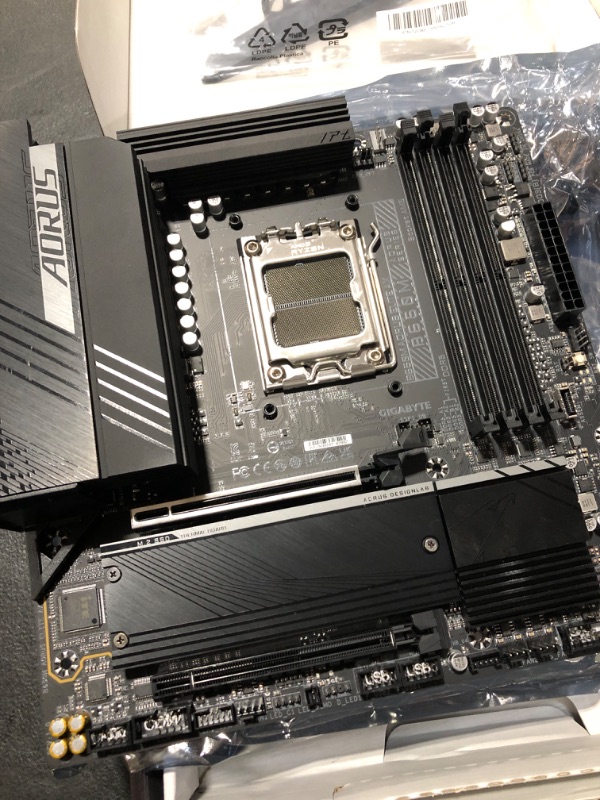 Photo 3 of GIGABYTE B650M AORUS Elite AX (AM5/ LGA 1718/ AMD B650/ Micro-ATX/ 5-Year Warranty/ DDR5/ 2* M.2/ PCIe 5.0/ USB 3.2 Gen2X2 Type-C/Intel 2.5GbE LAN/Q-Flash Plus/EZ-Latch/Gaming Motherboard) B650 B650M AORUS ELITE AX Bundle