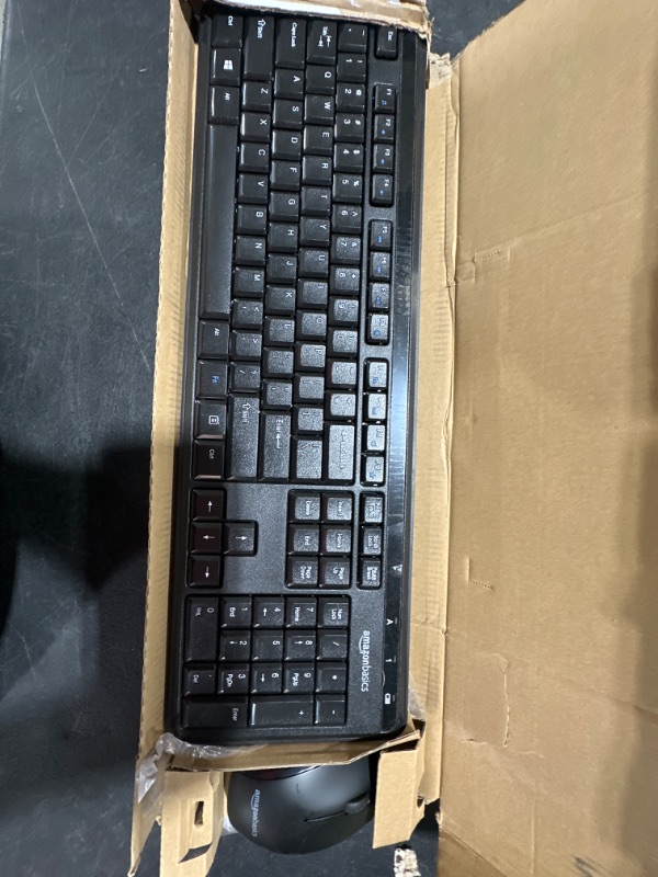 Photo 2 of Amazon Basics Wireless Computer Keyboard and Mouse Combo - Quiet and Compact - US Layout (QWERTY)