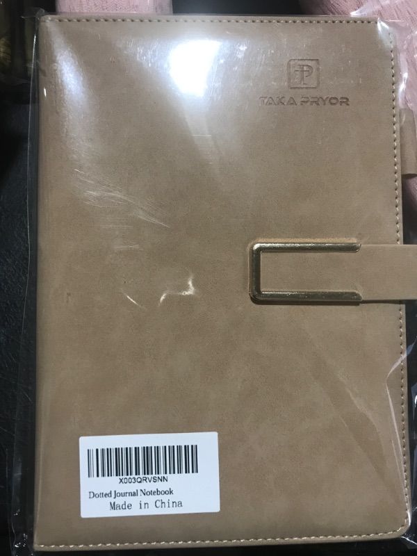 Photo 1 of brown journal notebook 