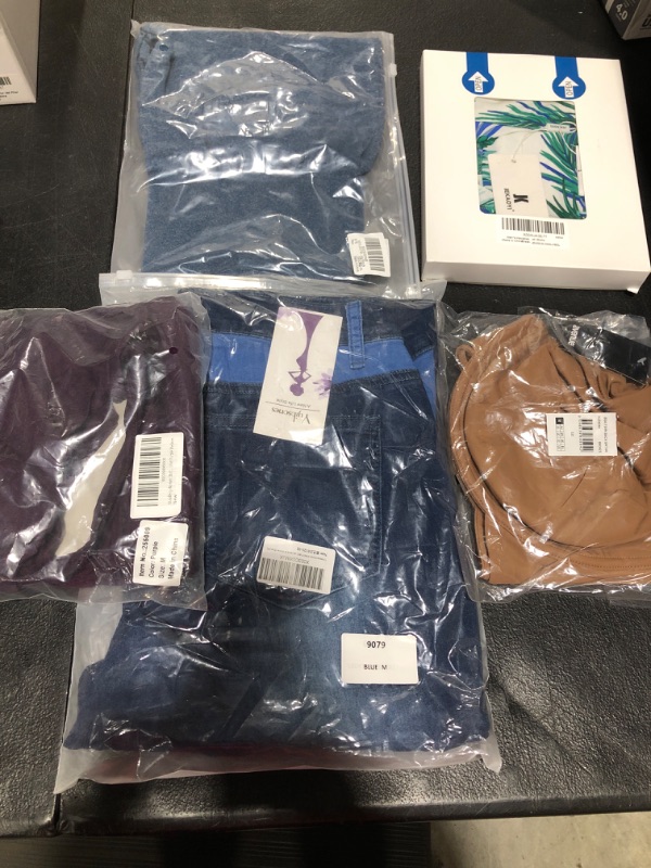 Photo 1 of BUNDLE OF NEW CLOTHING VARIOUS SIZES/STYLES
