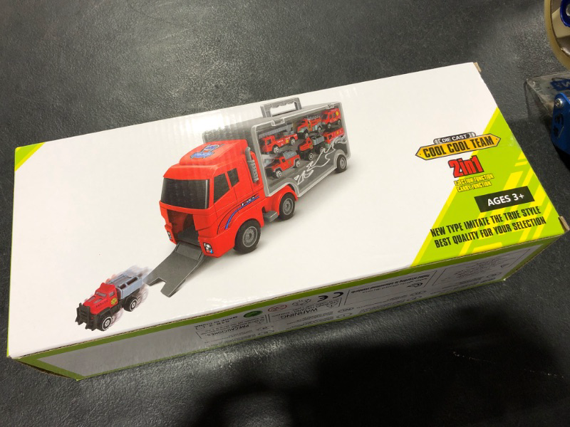 Photo 1 of 2 in 1 die cast truck carrier with mini trucks