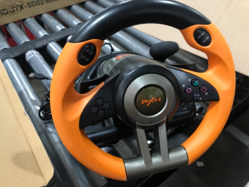 Photo 1 of PC Racing Wheel,PXN V3II 180 Degree Universal Usb Car Sim Race Steering Wheel with Pedals for PS3,PS4,Xbox One,Xbox Series X/S,Switch (Orange)