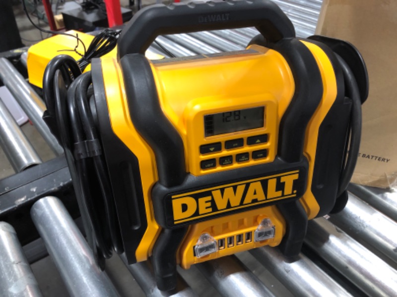 Photo 2 of DEWALT DXAEPS14 1600 Peak Battery Amp 12V Automotive Jump Starter/Power Station with 500 Watt AC Power Inverter, 120 PSI Digital Compressor, and USB Power , Yellow