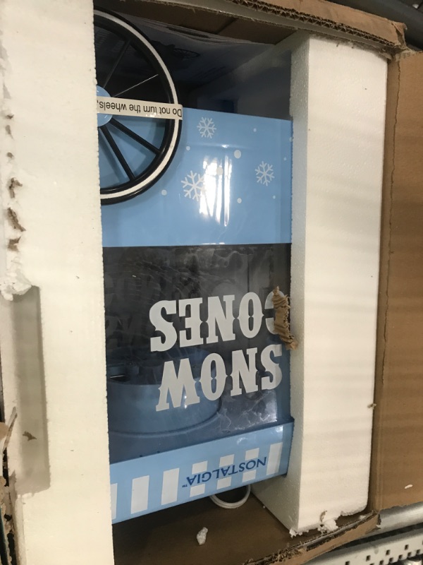 Photo 1 of Nostalgia Vintage Countertop Snow Cone Machine - Slushie Machine - Shaved Ice Machine and Crushed Ice Maker - Makes 20 Icy Treats, Includes 2 Reusable Plastic Cups & Ice Scoop – Blue
