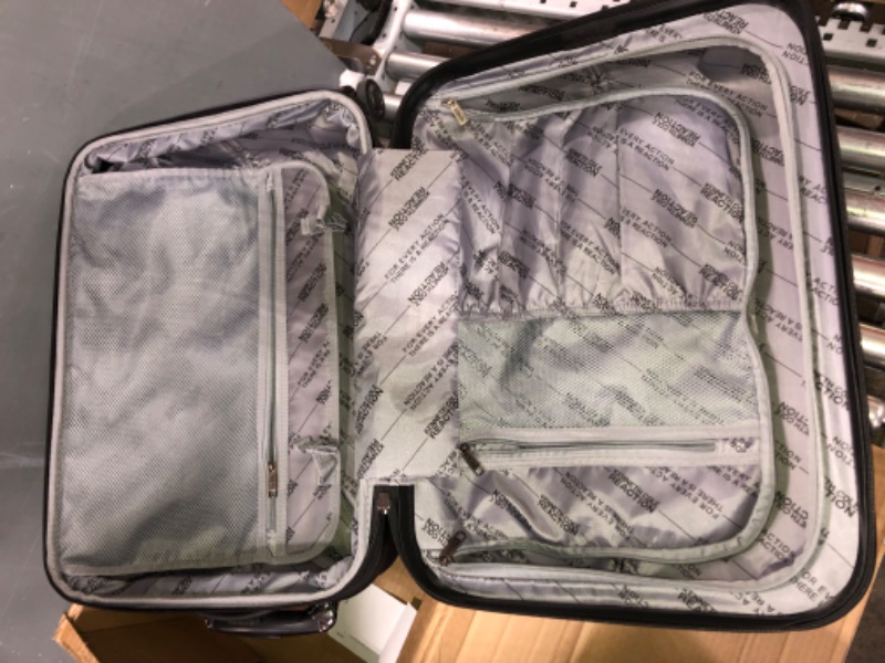 Photo 4 of (VISIBLY USED) Kenneth Cole REACTION Out Of Bounds Lightweight Durable Hardshell 4-Wheel Spinner Cabin Size Travel Suitcase, Naval, 20-Inch Carry On Naval 20-Inch Carry On