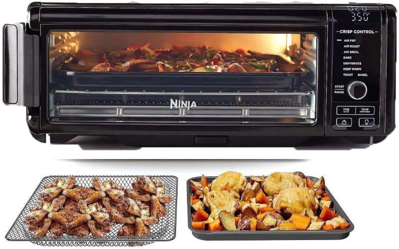 Photo 1 of **TESTED/ TURNS ON// DENT ON OVEN** Ninja Foodi 8-in-1 Digital Air Fry Oven