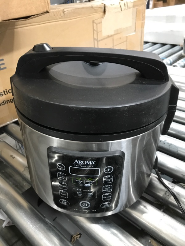 Photo 3 of ***TESTED/ TURNS ON// DENTED*** Aroma Housewares ARC-1120SBL SmartCarb Cool-Touch Stainless Steel Rice Multicooker Food Steamer, Slow Cooker with Non-Stick Inner Pot and Steam Tray, 20-Cup(cooked)/ 5Qt, Black Smart Carb
