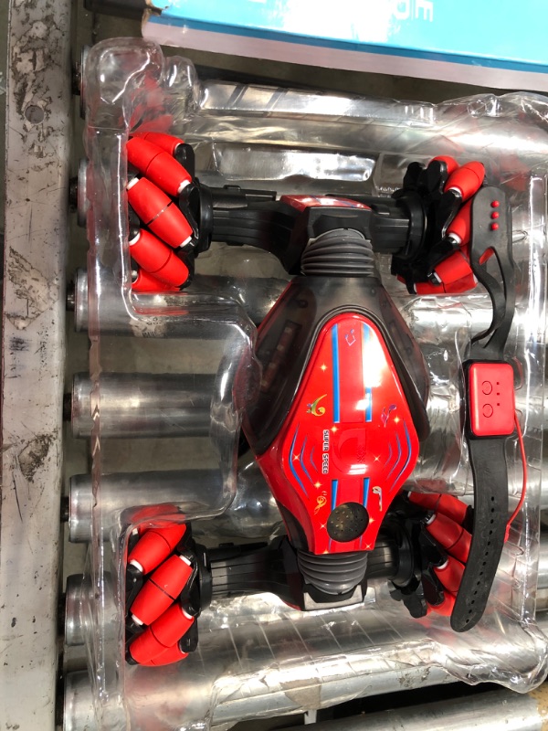 Photo 1 of **USED** Remote Control Car Hand Controlled Gesture RC Stunt Car with Spray & Lights & Music for Kids 6-13 Years Old, 4WD 2.4GHz Off-Road Vehicle 360° Double Sided Rotation Crawler Toy Car Gifts for Boys Girls