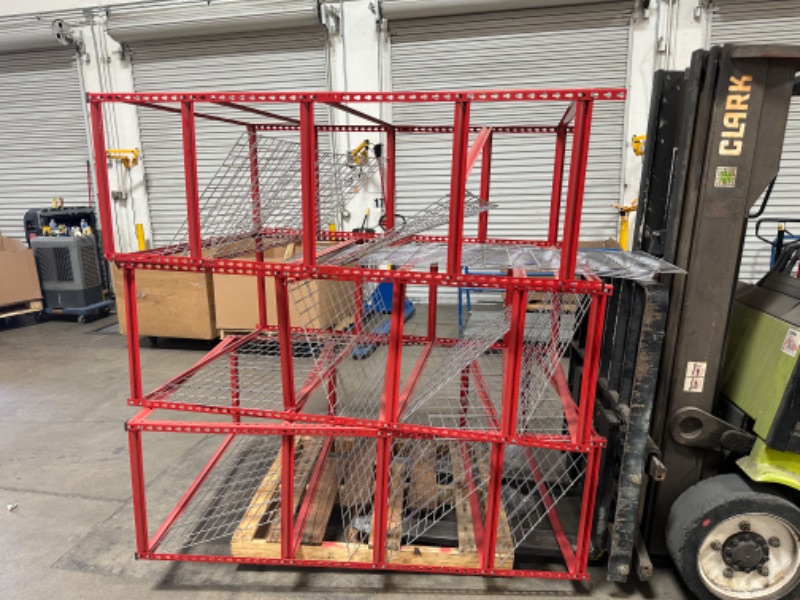 Photo 1 of **Bundle of three, 4 tier wire racks**