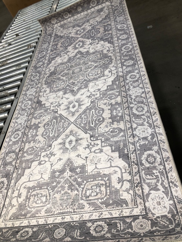 Photo 1 of **USED** White and Grey Rug72"x30" 