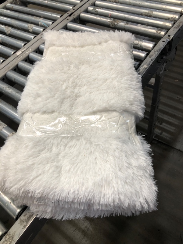 Photo 1 of **USED** Medium Sized White Fluffy Rug, unspecified dimensions 