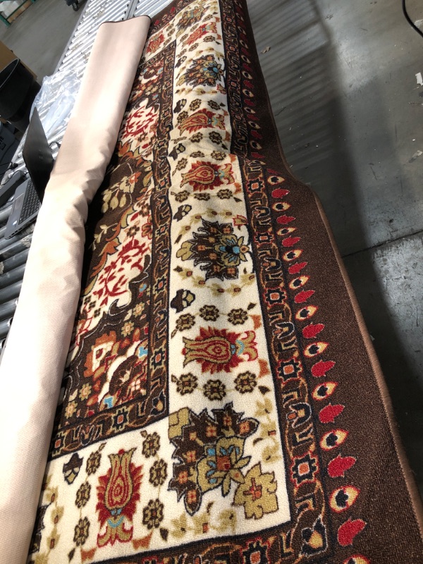 Photo 1 of **USED** Very Large Multi-Colored Rug, unspecified dimensions 
