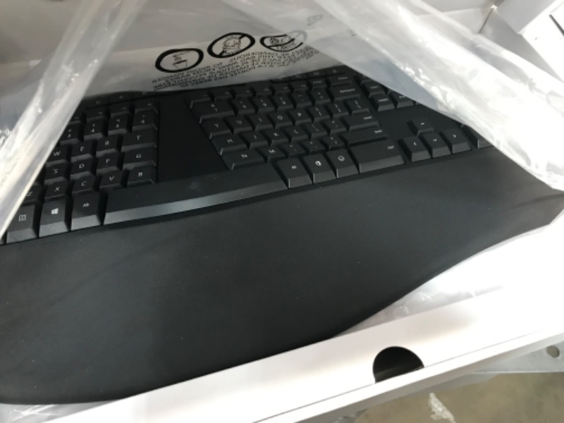 Photo 2 of Microsoft Ergonomic Keyboard - Black. Wired, Comfortable, Ergonomic Keyboard with Cushioned Wrist and Palm Support. Split Keyboard. Dedicated Office Key.