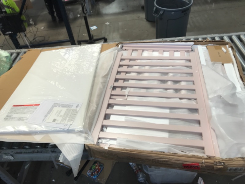 Photo 1 of Dream On Me Ava 4-in-1 Convertible Mini Crib in Blush Pink, 