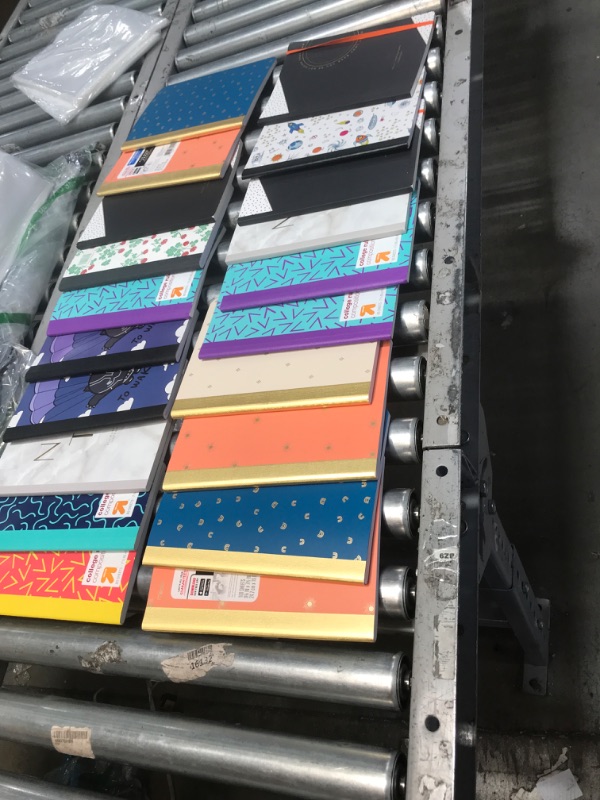Photo 1 of BUNDLE OF ASSORTED RULED COMPOSITION NOTEBOOKS  (20 NOTEBOOKS)