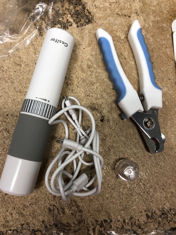 Photo 2 of **USED/MOSSIBLE MISSING PARTS**  Casifor Dog Nail Grinder 10h Working Time Powerful Professional Quiet Electric Pet Nail Trimmer Stepless Speed Regulation Painless Nail File for Large Medium Small Dogs and Cats White