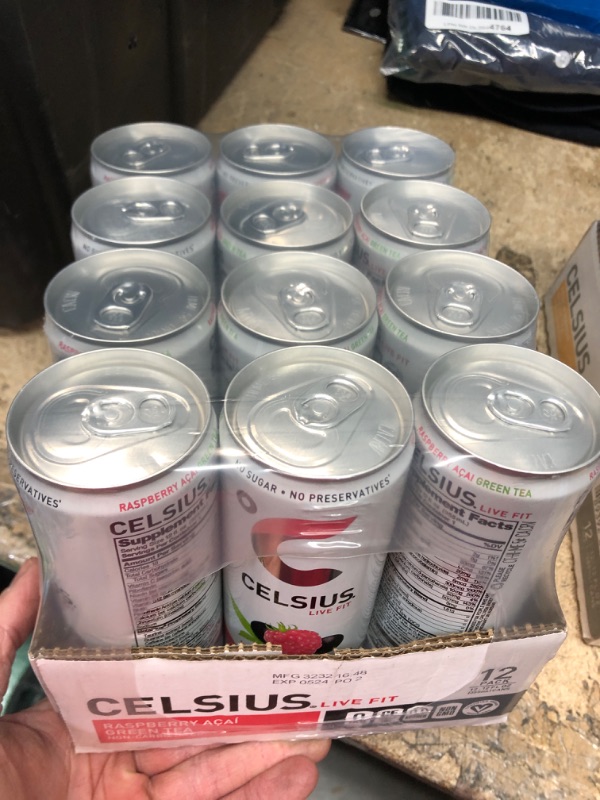 Photo 2 of **NEW/FACTORY SEALED**  CELSIUS Raspberry Acai Green Tea, Functional Essential Energy Drink 12 Fl Oz (Pack of 12) Raspberry Acai Green Tea 12 Fl Oz (Pack of 12) Expiration Date: 05/2024