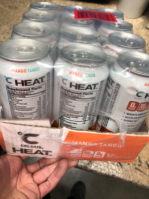 Photo 2 of **NEW/FACTORY SEALED**  CELSIUS HEAT Performance Energy Drink 16 Fl Oz, Mango Tango (Pack of 12) Expiration Date: 03/2023