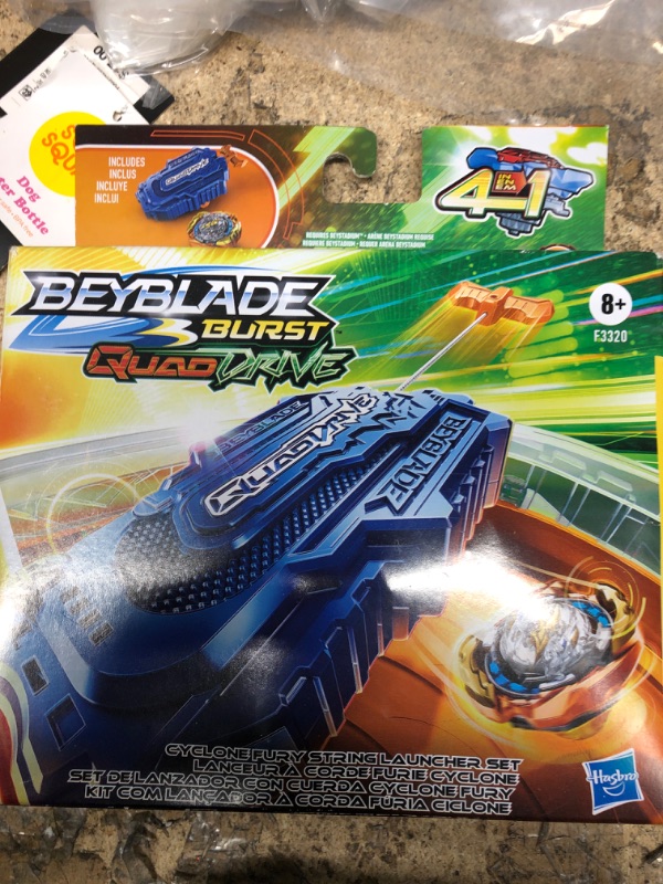 Photo 2 of Beyblade Burst QuadDrive Cyclone Fury String Launcher Set -- Battle Game Set with String Launcher and Right-Spin Battling Top Toy