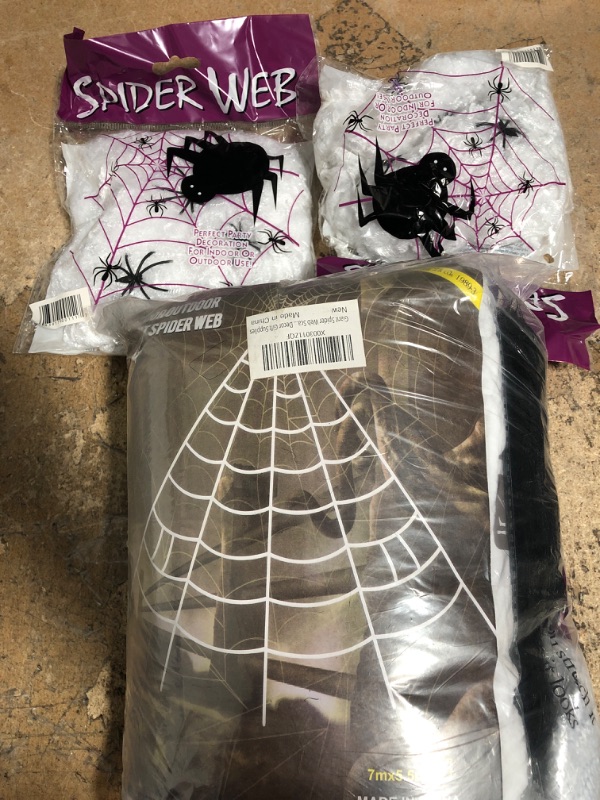 Photo 1 of a bundle of Halloween spider web 3 items