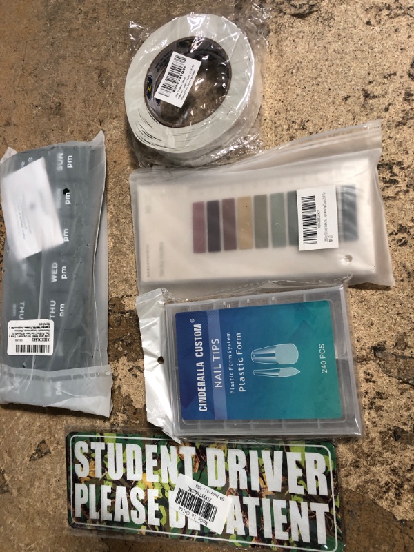 Photo 1 of 10 assorted items student driver magnet, nail tips, pill sorter, adhesive tape, double sided mounting tape, kitchenware, and misc. 