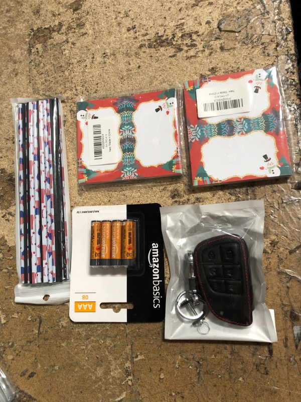 Photo 2 of 10 assorted items apple pencil tip, plastic sealable, key case, AAA batteries, car outlet trim, and misc.