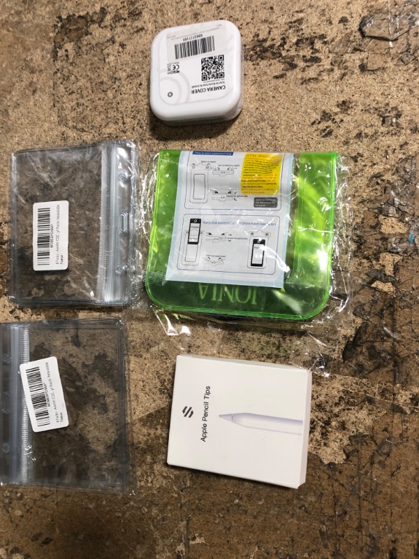 Photo 1 of 10 assorted items apple pencil tip, plastic sealable, key case, AAA batteries, car outlet trim, and misc.