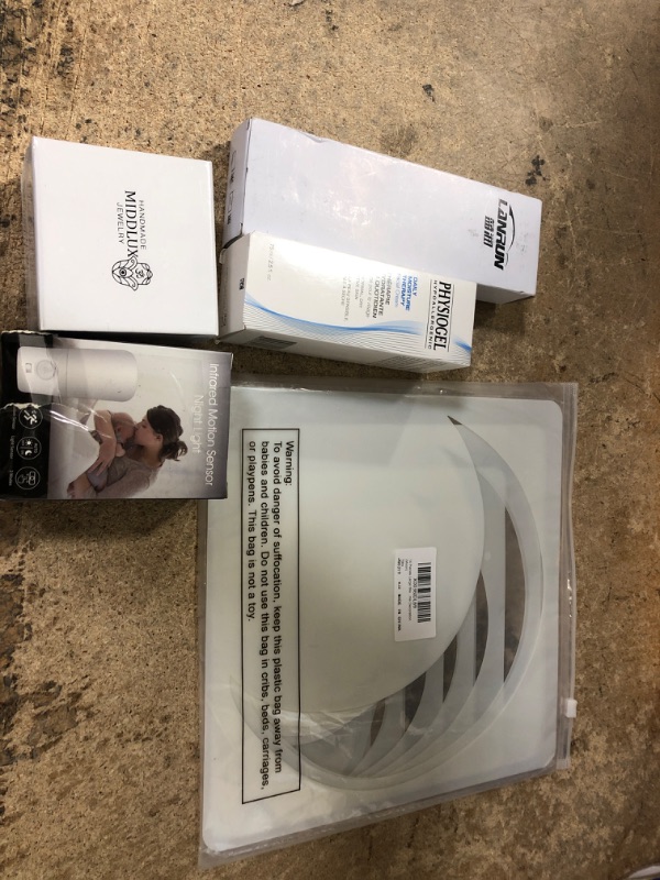 Photo 1 of 10 assorted items design white paper, physiogel, middlux jewelry, cars eat headrest, wig cap, and misc 