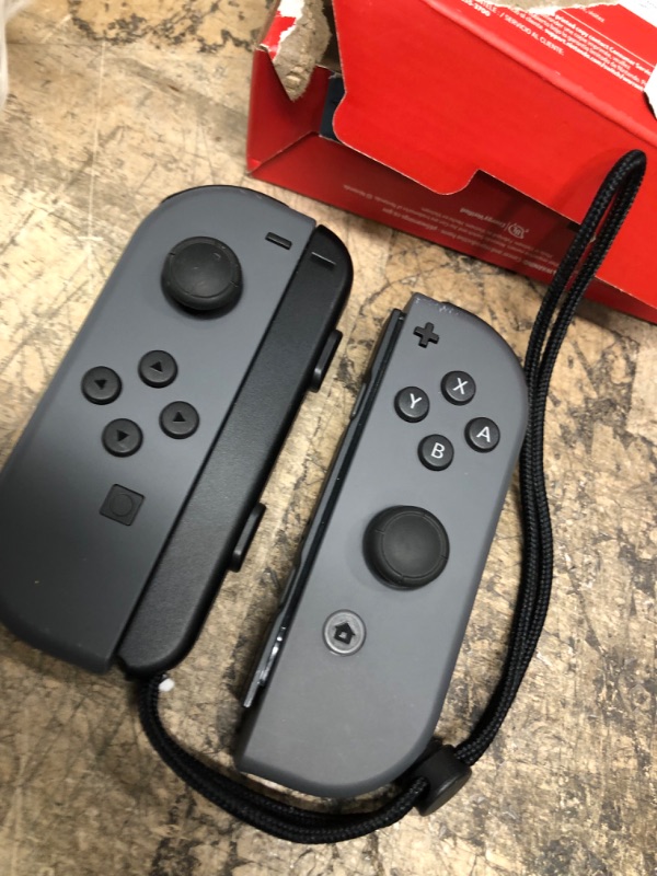 Photo 2 of **ITEM CIRCLED IN MAIN PHOTO IS MISSING**
Nintendo Joy-Con (L/R) - Gray
