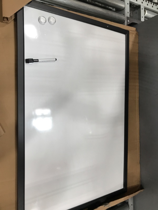 Photo 3 of Amazon Basics Magnetic Dry Erase White Board, 35 x 23-Inch Whiteboard - Black Wooden Frame 23"x35" Magnetic, Wood Frame