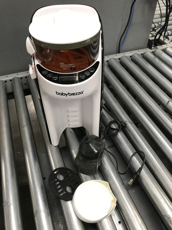 Photo 2 of New and Improved Baby Brezza Formula Pro Advanced Formula Dispenser Machine - Automatically Mix a Warm Formula Bottle Instantly - Easily Make Bottle with Automatic Powder Blending