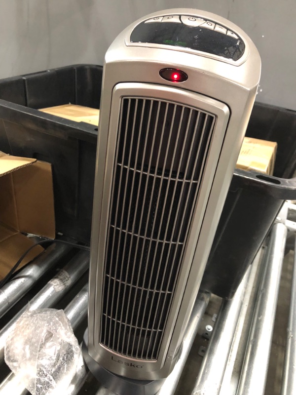Photo 1 of Lasko 1500W Digital Ceramic Space Heater with Remote, 755320, Silver