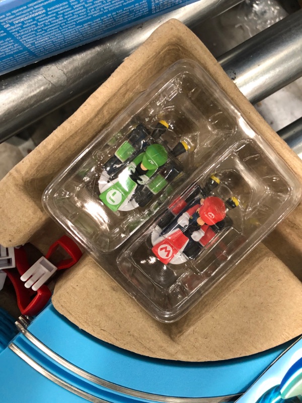 Photo 2 of Carrera First Nintendo Mario Kart Slot Car Race Track - Includes 2 Cars: Mario and Luigi and Two-Controllers - Battery-Powered Beginner Set for Kids Ages 3 Years and Up, 20063028 Mario Kart / Flippers