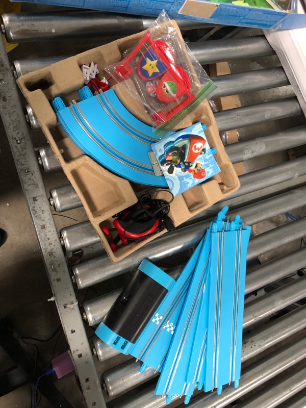 Photo 1 of Carrera First Nintendo Mario Kart Slot Car Race Track - Includes 2 Cars: Mario and Luigi and Two-Controllers - Battery-Powered Beginner Set for Kids Ages 3 Years and Up, 20063028 Mario Kart / Flippers