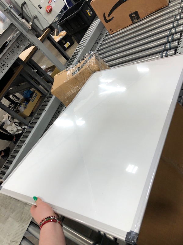 Photo 1 of Amazon Basics Magnetic Dry Erase White Board, 36 x 24-Inch Whiteboard - Silver Aluminum Frame 24" x 36" Magnetic, Aluminum Frame
