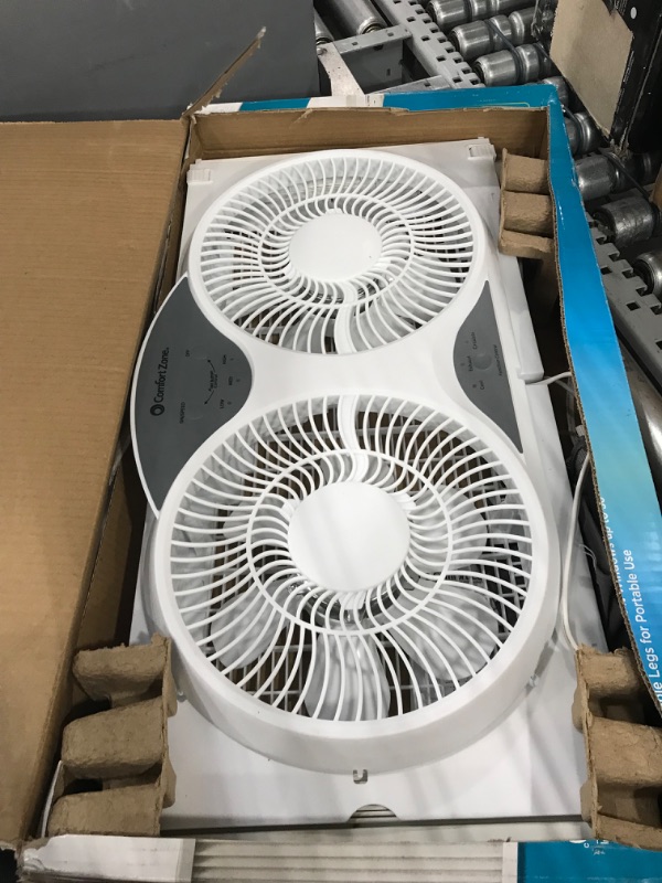 Photo 5 of **USED**   Comfort Zone CZ310R Adjustable Width 3 Speed Dual Reversible Multi Functional Window Sill Fan with Remote Control and Removable Cover, White