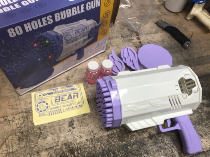 Photo 2 of 80 Hole Bubble Gun with Bubble Solution for Kids That Can Make Massive Bubbles,Electronic Automatic Bubble Blower with Lights,Best Gifts for Boys and Girls,Toddler Outdoor Toys for Kids Ages 4-8 Purple