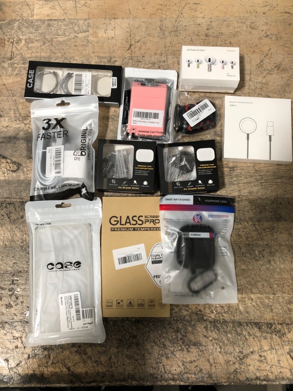 Photo 1 of BUNDLE OF PHONE, AIR POD AND APPLE WATCH ACCESORIES (11 ITEMS)