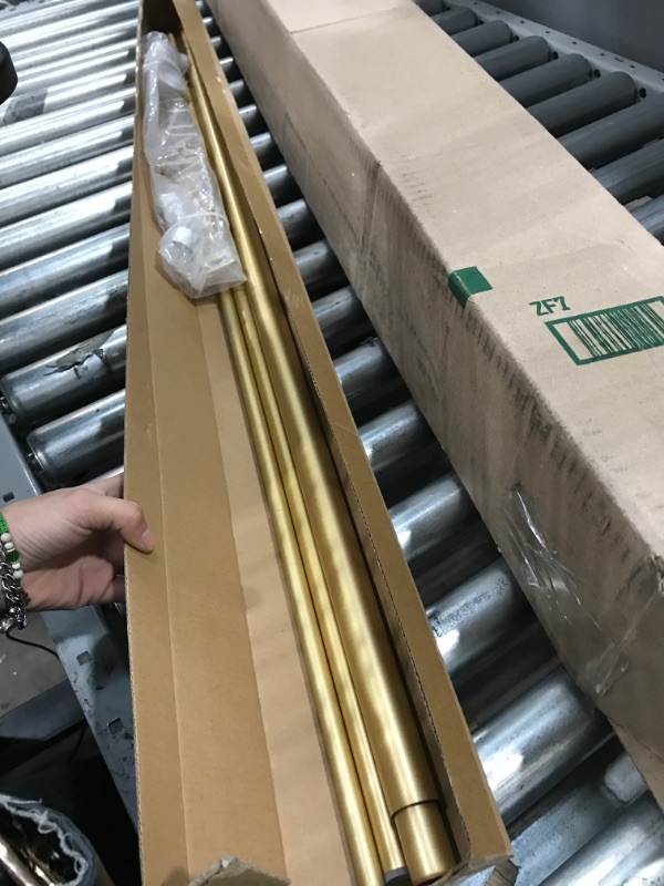 Photo 1 of 28"-48", 48"-84" Gold curtain rod
