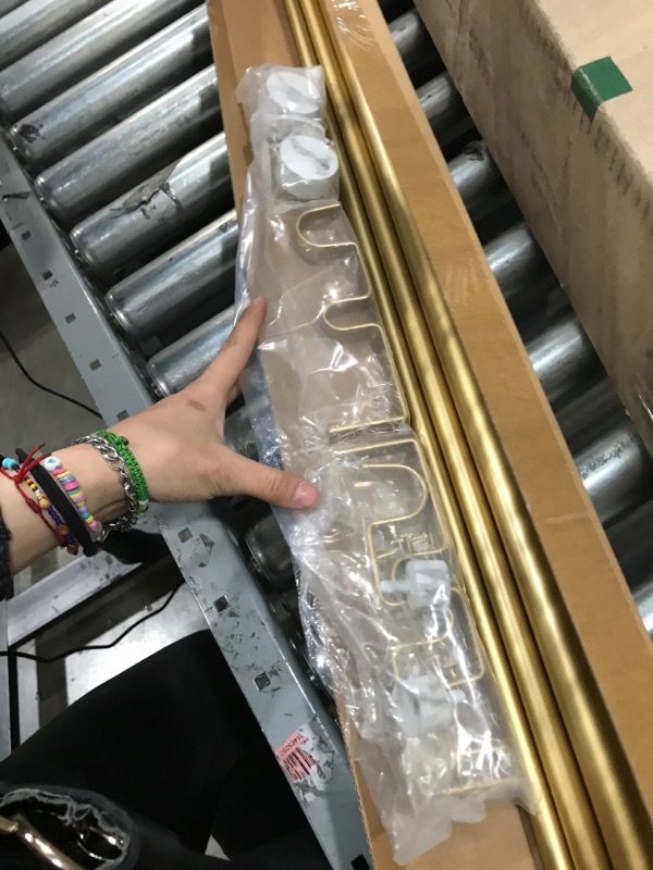 Photo 1 of 28"-48", 48"-84" Gold curtain rod