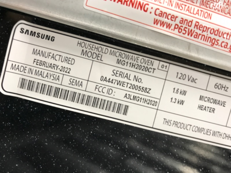 Photo 5 of ***TESTED/ TURNS ON// SIDE FALLING APART***  SAMSUNG 1.1 Cu Ft Countertop Microwave Oven w/ Grilling Element, Ceramic Enamel Interior, Auto Cook Options, 1000 Watt, MG11H2020CT/AA, Stainless Steel, Black w/ Mirror Finish
